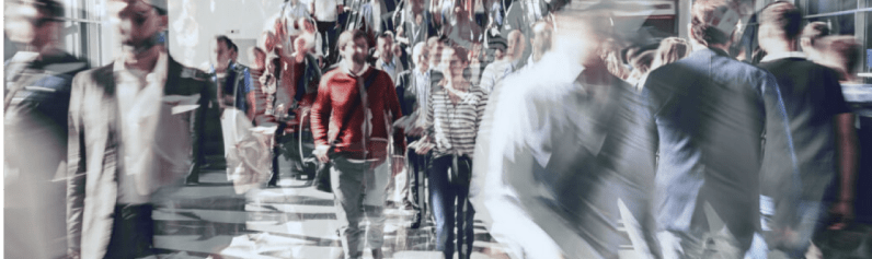 crowd of people moving fast