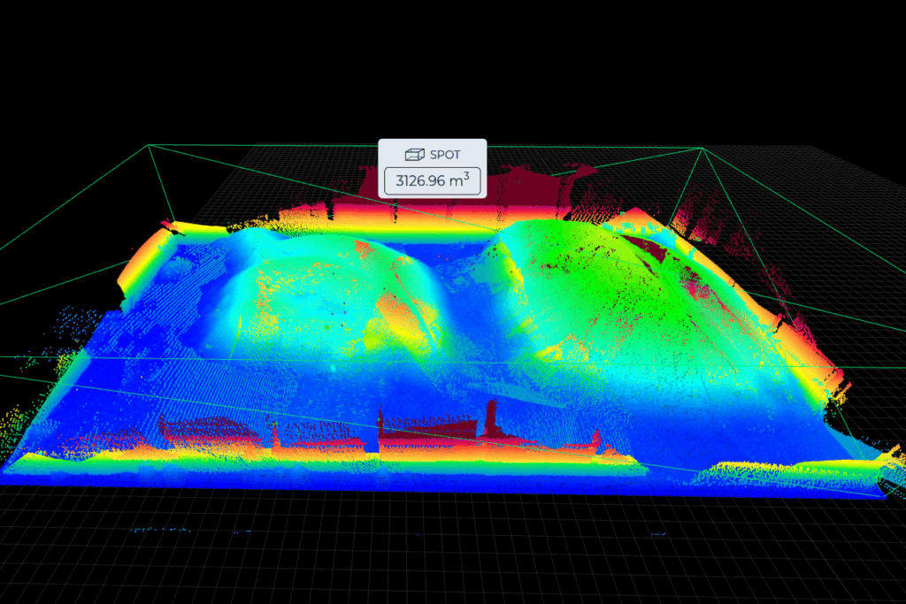 Combined 3D point cloud of a large bulk material stockpile with fused sensor data and visible volume zone for stockpile volume monitoring